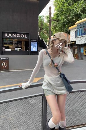 Hollowed-Out Knitted Cardigan for Women - American Style, Slim Fit, Layered Design, Elegant Autumn Fashion Top