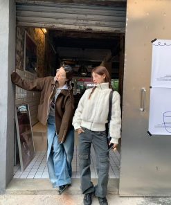 Korean Style Pumpkin Faux Mink Fur Coat with Eco-Friendly Knitted Splicing and High-Neck Zipper Detail