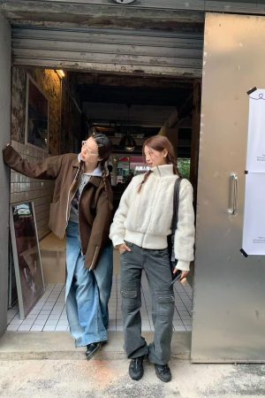 Korean Style Pumpkin Faux Mink Fur Coat with Eco-Friendly Knitted Splicing and High-Neck Zipper Detail