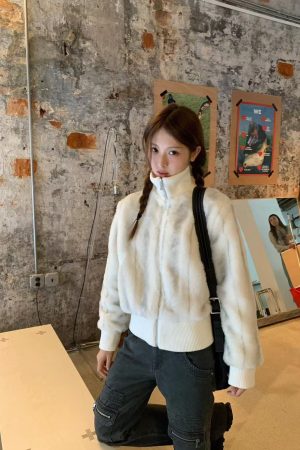 Korean Style Pumpkin Faux Mink Fur Coat with Eco-Friendly Knitted Splicing and High-Neck Zipper Detail