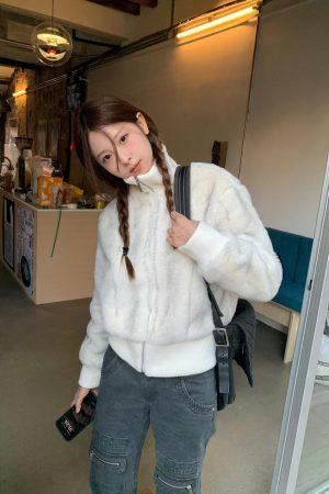 Korean Style Pumpkin Faux Mink Fur Coat with Eco-Friendly Knitted Splicing and High-Neck Zipper Detail