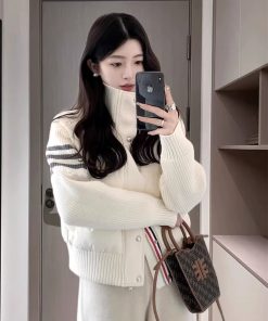 Korean-Style Warm Stand-Collar Short Down Jacket with Spliced Knitted Sleeves for Women - Fashionable Autumn Winter Coat 2025