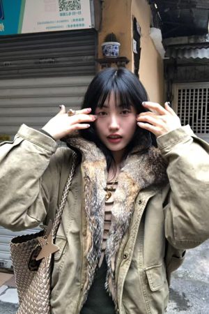 Korean Style Women's Winter Thick Parka Jacket with Fur Collar and Mountain Carving Design in Pumpkin Color