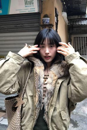 Korean Style Women's Winter Thick Parka Jacket with Fur Collar and Mountain Carving Design in Pumpkin Color