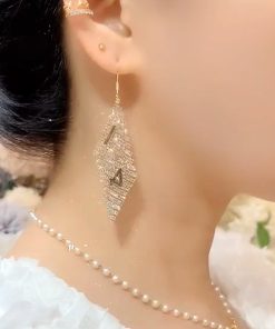 Light Luxury Crystal Diamond-Shaped Earrings with Zircon â€“ Versatile High-End Ethnic Style Ear Hooks for Fashionable Looks