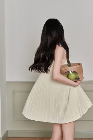 Loose and Slimming Pleated Doll Skirt Dress in Ice Silk Knit - Stylish Sleeveless Design for 90s and Y2K Fashion Lovers