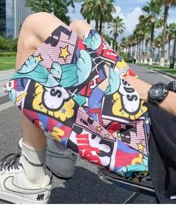 Men's Summer Loose Ice Silk Shorts, Quick-Dry Beach Pants with Trendy Cartoon Print, Breathable Casual Five-Point Style