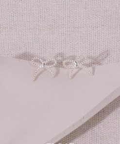 Minimalist Floating Bowknot Stud Earrings in S925 Silver - Youthful High-End Twisted Design for Elegant Everyday Wear