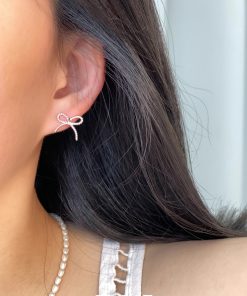 Minimalist Floating Bowknot Stud Earrings in S925 Silver - Youthful High-End Twisted Design for Elegant Everyday Wear