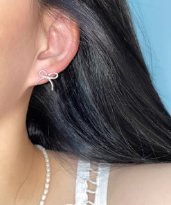 Minimalist Floating Bowknot Stud Earrings in S925 Silver - Youthful High-End Twisted Design for Elegant Everyday Wear