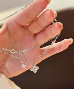 Minimalist Four-Leaf Flower Pendant Necklace with Sparkling Zircon for Women - Versatile 2025 Style, Elegant Fashion Accessory
