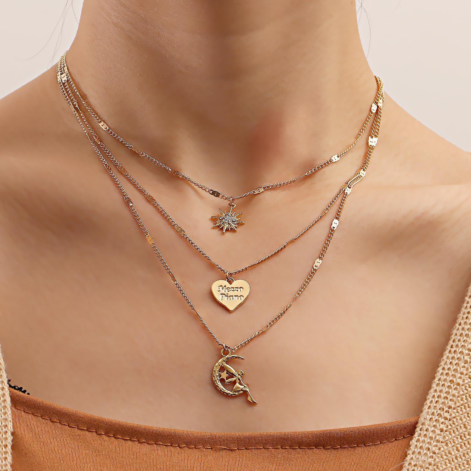 Multi-Layer Gold Vintage Heart Necklace with Eight-Pointed Star Clavicle Chain - European American Niche Jewelry Fashion Multi-Layer Gold Vintage Heart Necklace with Eight-Pointed Star Clavicle Chain - European American Niche Jewelry Fashion