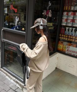 Off-Shoulder Sweatshirt and Deep Gray Half-Skirt Casual Outfit - Trendy American Style with Long Pants for Effortless Chic Look