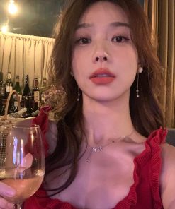 Pearl Camellia Tassel Earrings - Niche Retro Light Luxury Design, High-End Statement Jewelry for Elegant Style