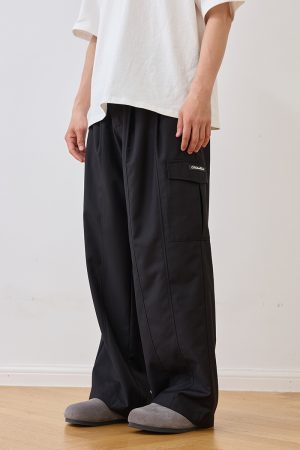 Pleated Clean Fit Trousers with Pocket and Spliced Design for a Harsh and Cruel Aesthetic