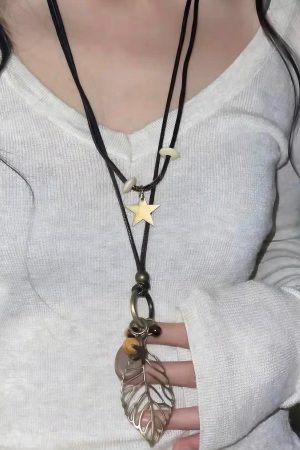 Retro Bohemian Hollow Leaf Pendant Necklace for Women - Versatile Double-Layer Sweater Chain Accessory in Chinese Style