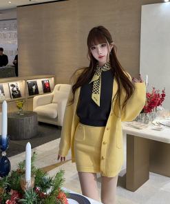 Spring 2025 Women's Niche Knitted Two-Piece Set - Artistic Jacket and Short Skirt for Stylish Fashion Lovers