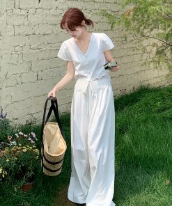 Summer 2025 Women's French Lace Patchwork Top & White Wide-Leg Pants Two-Piece Set - Unique and Beautiful Fashion