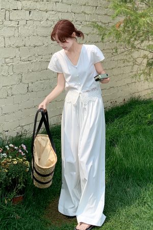 Summer 2025 Women's French Lace Patchwork Top & White Wide-Leg Pants Two-Piece Set - Unique and Beautiful Fashion
