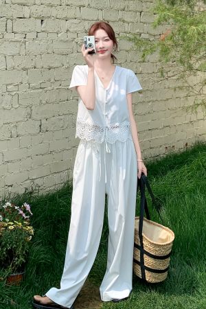 Summer 2025 Women's French Lace Patchwork Top & White Wide-Leg Pants Two-Piece Set - Unique and Beautiful Fashion