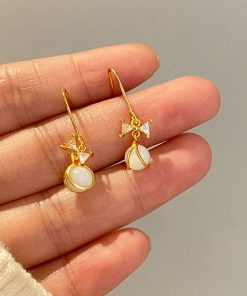 Trendy Cool-Toned Cat's Eye Stone Bowknot Stud Earrings - 2025 High-End Fashionable Niche Design for a Chic Look