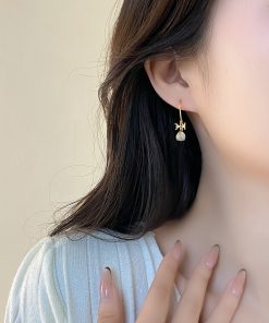 Trendy Cool-Toned Cat's Eye Stone Bowknot Stud Earrings - 2025 High-End Fashionable Niche Design for a Chic Look