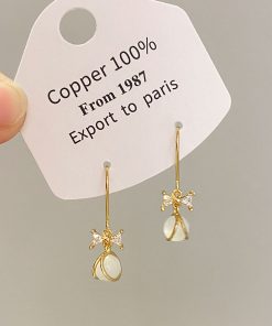 Trendy Cool-Toned Cat's Eye Stone Bowknot Stud Earrings - 2025 High-End Fashionable Niche Design for a Chic Look