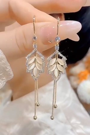 Trendy French High-End Style Long Tassel Ear Hooks with Micro-Inlaid Maple Leaf Design for a Slimming Effect