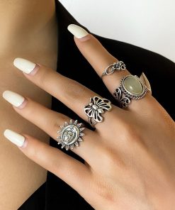 Trendy Hip-Hop Retro Egg Face and Butterfly Ring Set - European and American Jewelry Design for Unique Style