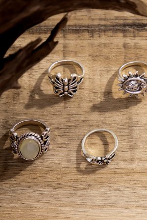 Trendy Hip-Hop Retro Egg Face and Butterfly Ring Set - European and American Jewelry Design for Unique Style