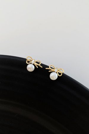Trendy Hollowed-Out Bow Imitation Pearl Stud Earrings for Women - 2025 High-End Light Luxury Ear Accessories