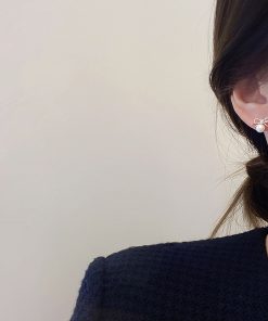 Trendy Hollowed-Out Bow Imitation Pearl Stud Earrings for Women - 2025 High-End Light Luxury Ear Accessories
