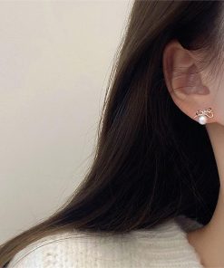 Trendy Hollowed-Out Bow Imitation Pearl Stud Earrings for Women - 2025 High-End Light Luxury Ear Accessories