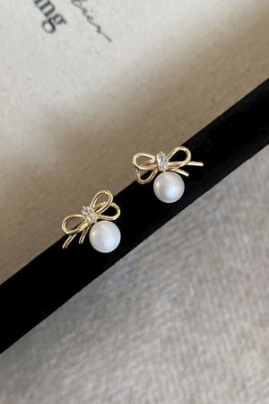 Trendy Hollowed-Out Bow Imitation Pearl Stud Earrings for Women - 2025 High-End Light Luxury Ear Accessories