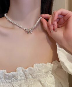 Trendy Pearl Bowknot Necklace for Women - Light Luxury Clavicle Chain, High-End Niche Design Accessory for 2025 Fashion