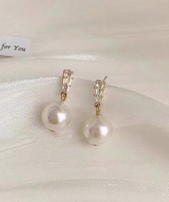 Trendy Pearl Stud Earrings for Women - 2025 French Light Luxury Design for Ear Piercings, High-End Niche Fashion Accessory