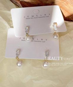 Trendy Pearl Stud Earrings for Women - 2025 French Light Luxury Design for Ear Piercings, High-End Niche Fashion Accessory