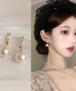 Trendy Pearl Stud Earrings for Women - 2025 French Light Luxury Design for Ear Piercings, High-End Niche Fashion Accessory