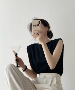 Trendy Sleeveless White Top with Straight Shoulder Pads, Flutter Sleeves, and Loose Round Neck - European American Style for Women