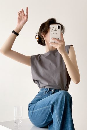 Trendy Sleeveless White Top with Straight Shoulder Pads, Flutter Sleeves, and Loose Round Neck - European American Style for Women