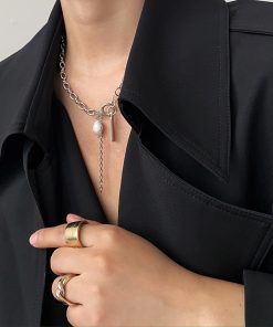 Trendy Two-Tone Gold and Silver Clavicle Chain Necklace with Diamond-Inlaid Metal and Pearl Accents