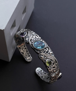 Vintage Hollow Carved Blue Topaz Bracelet for Women - 2025 Retro High-End Jewelry, Exquisite Versatile Design