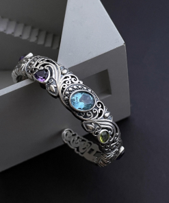 Vintage Hollow Carved Blue Topaz Bracelet for Women - 2025 Retro High-End Jewelry, Exquisite Versatile Design